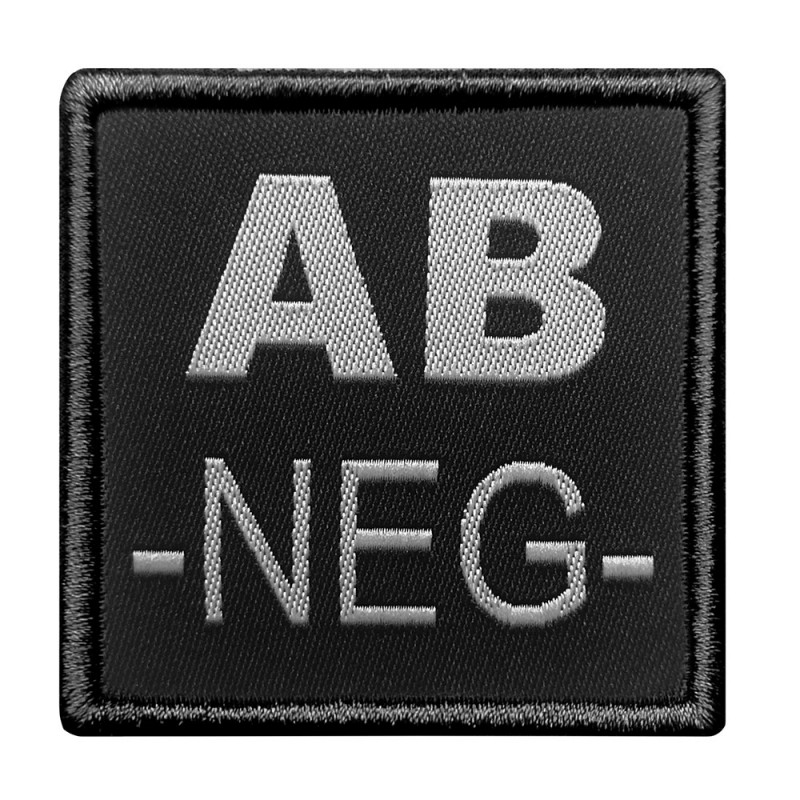 Groupe sanguin AB négatif brodé sur tissu noir